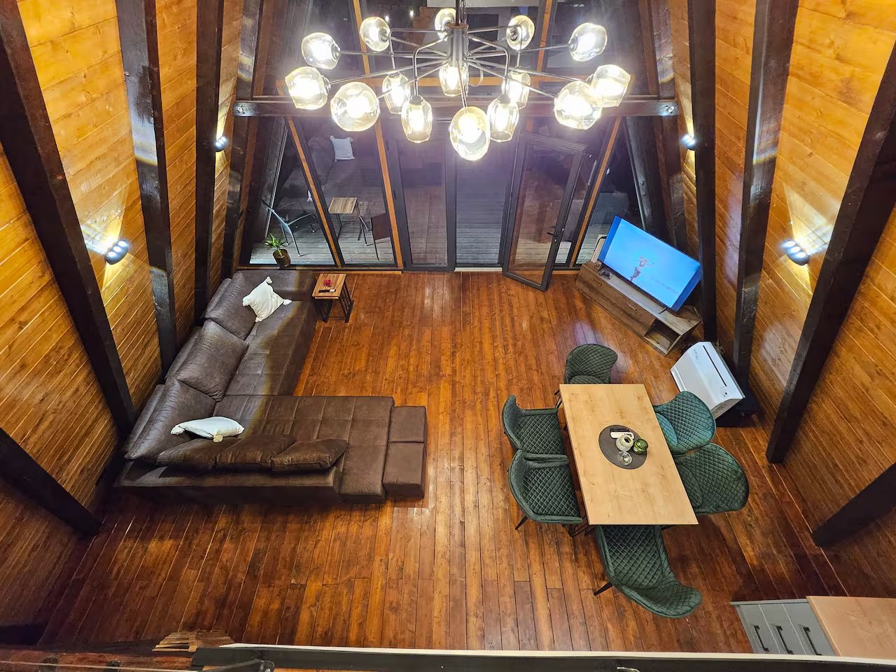 Garden walkway with decorative string lights at night