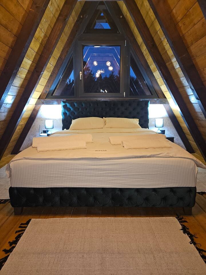 Master bedroom overhead view with elegant bedding