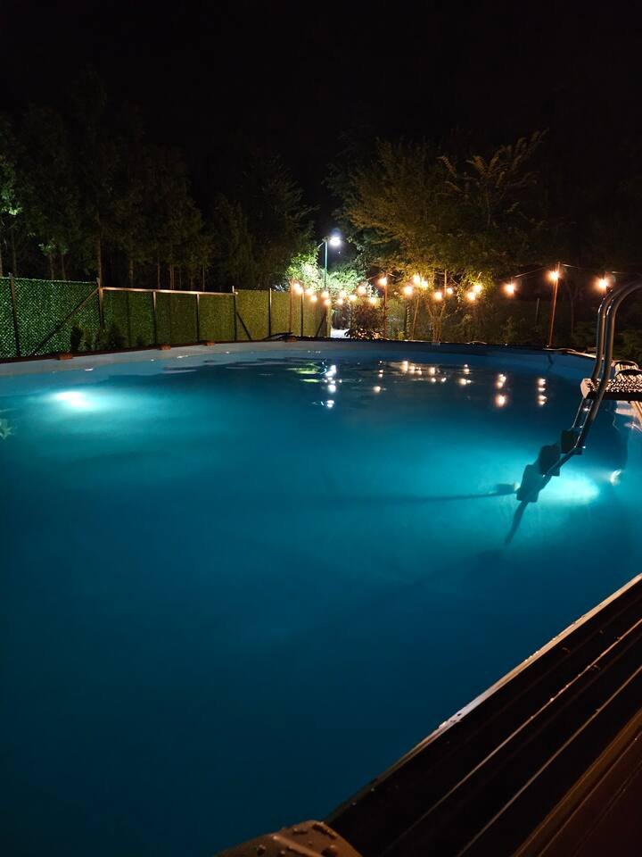 Pool and garden overview in the evening light